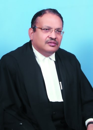 Dr. Justice Satish Chandra