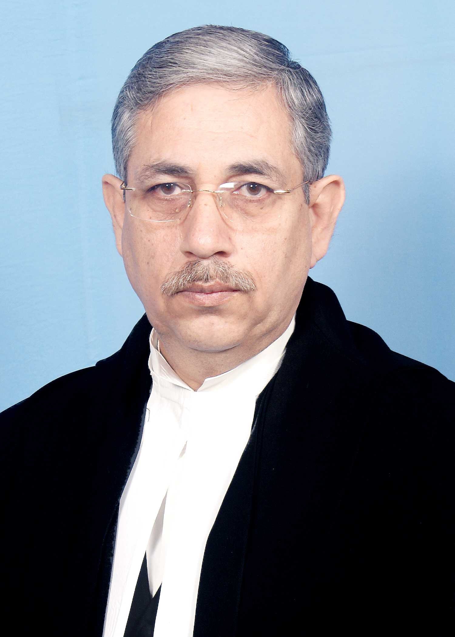 Dr. Justice Devendra Kumar Arora